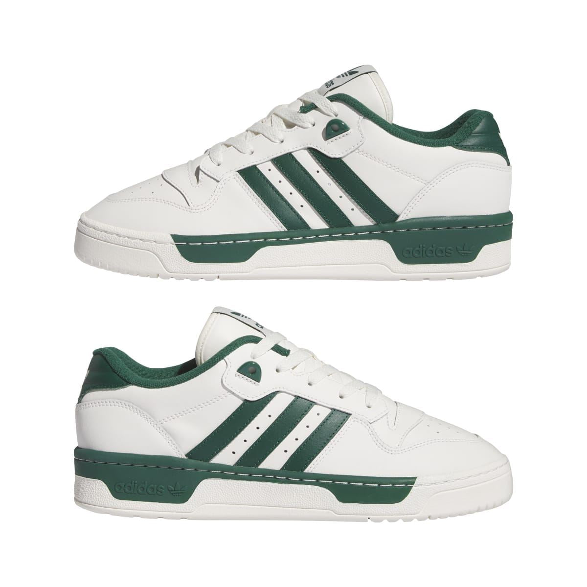 Pair of adidas Rivalry Low trainers in white with green stripes and lace-up design