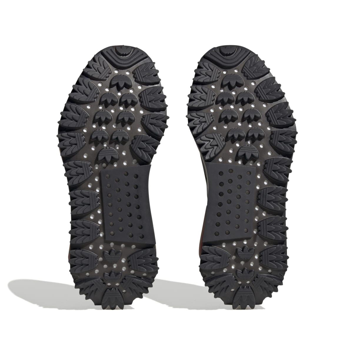 Black adidas Originals NMD S1 outsole tread, rugged spikes with stud details