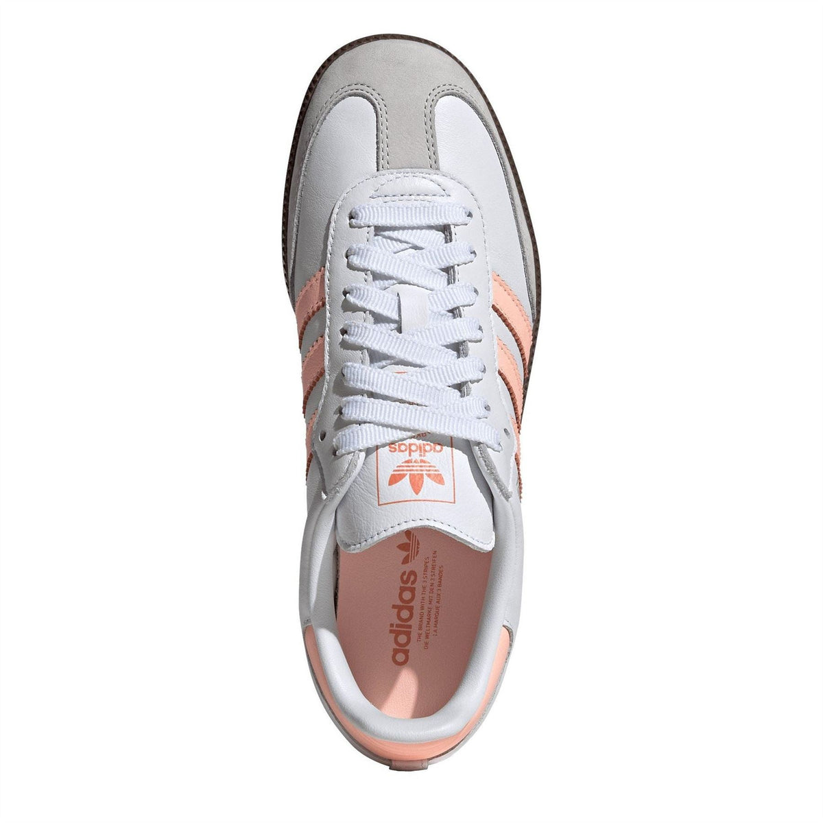 adidas Originals Samba OG trainers, classic black and white footwear with suede and leather upper, casual sports shoes.