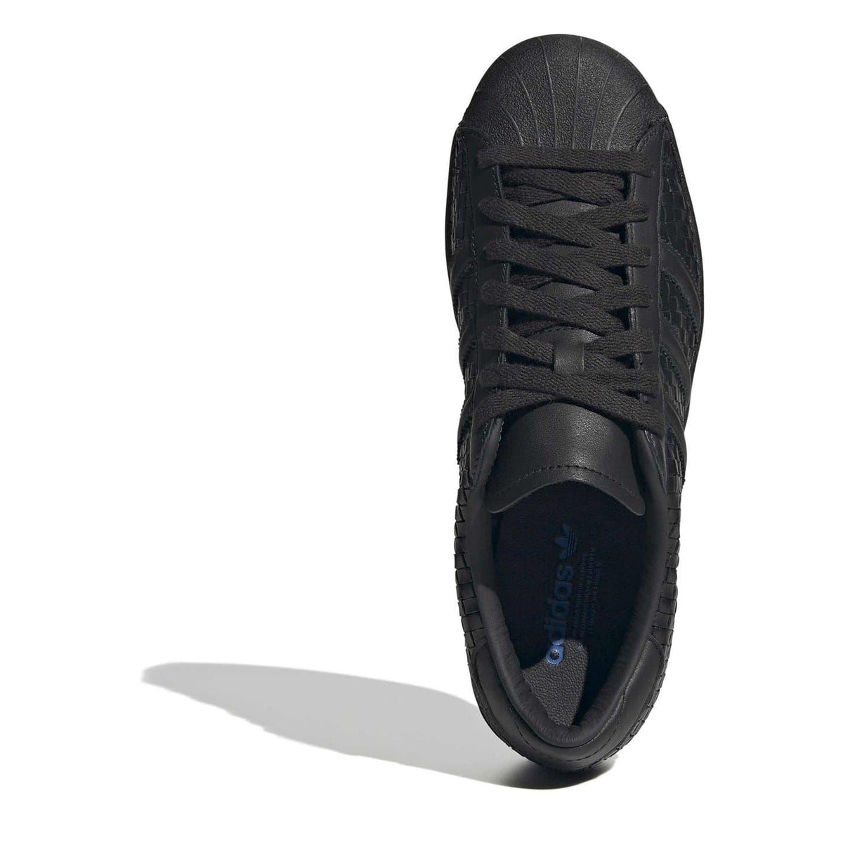 Black lace-up sneaker with padded collar and visible interior lining
