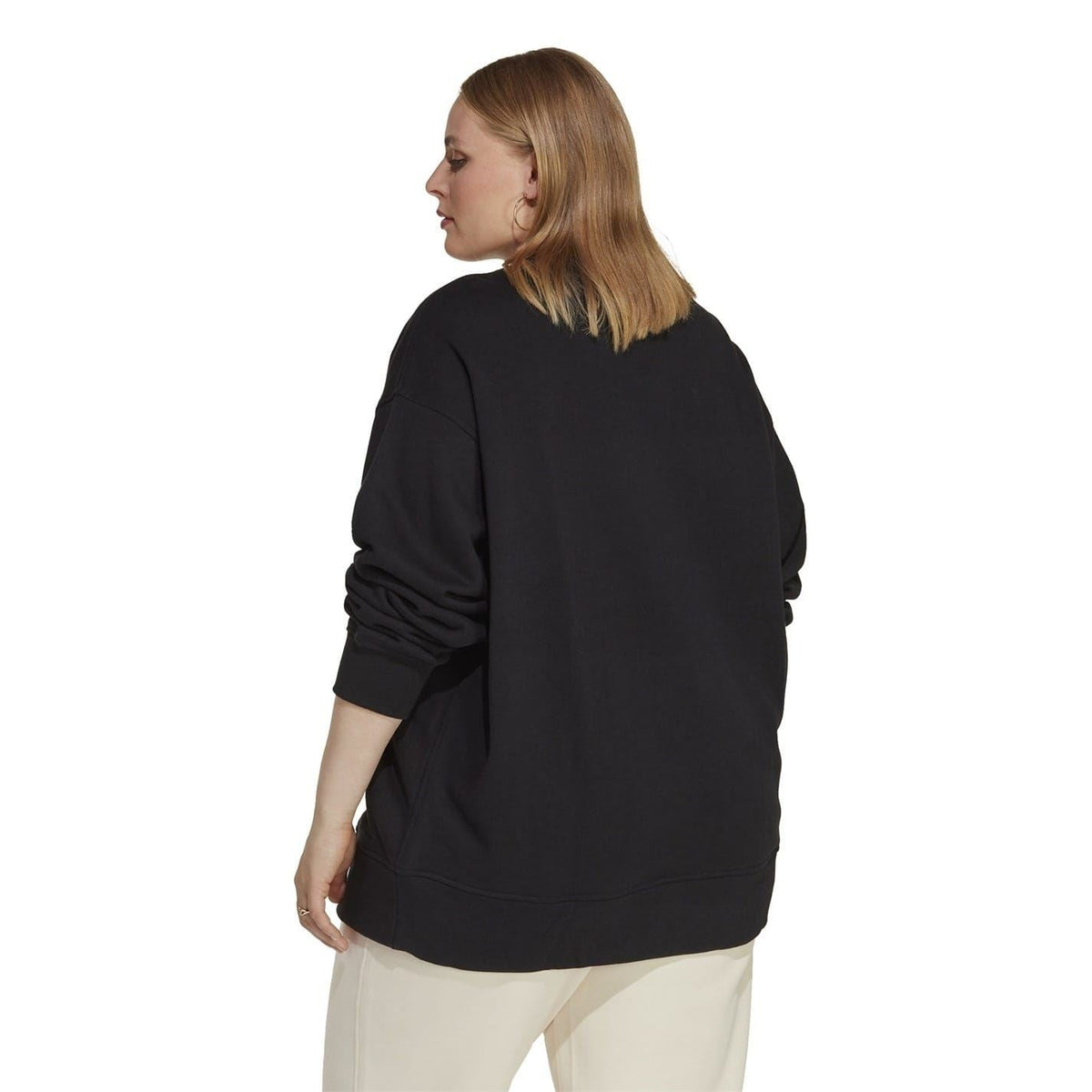 Black cropped sweatshirt back view with dropped shoulders and ribbed hem