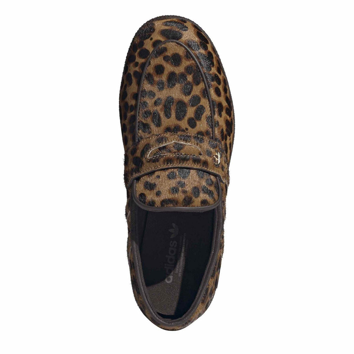 Leopard-print slip-on sneaker toe view with stitched edge and black interior