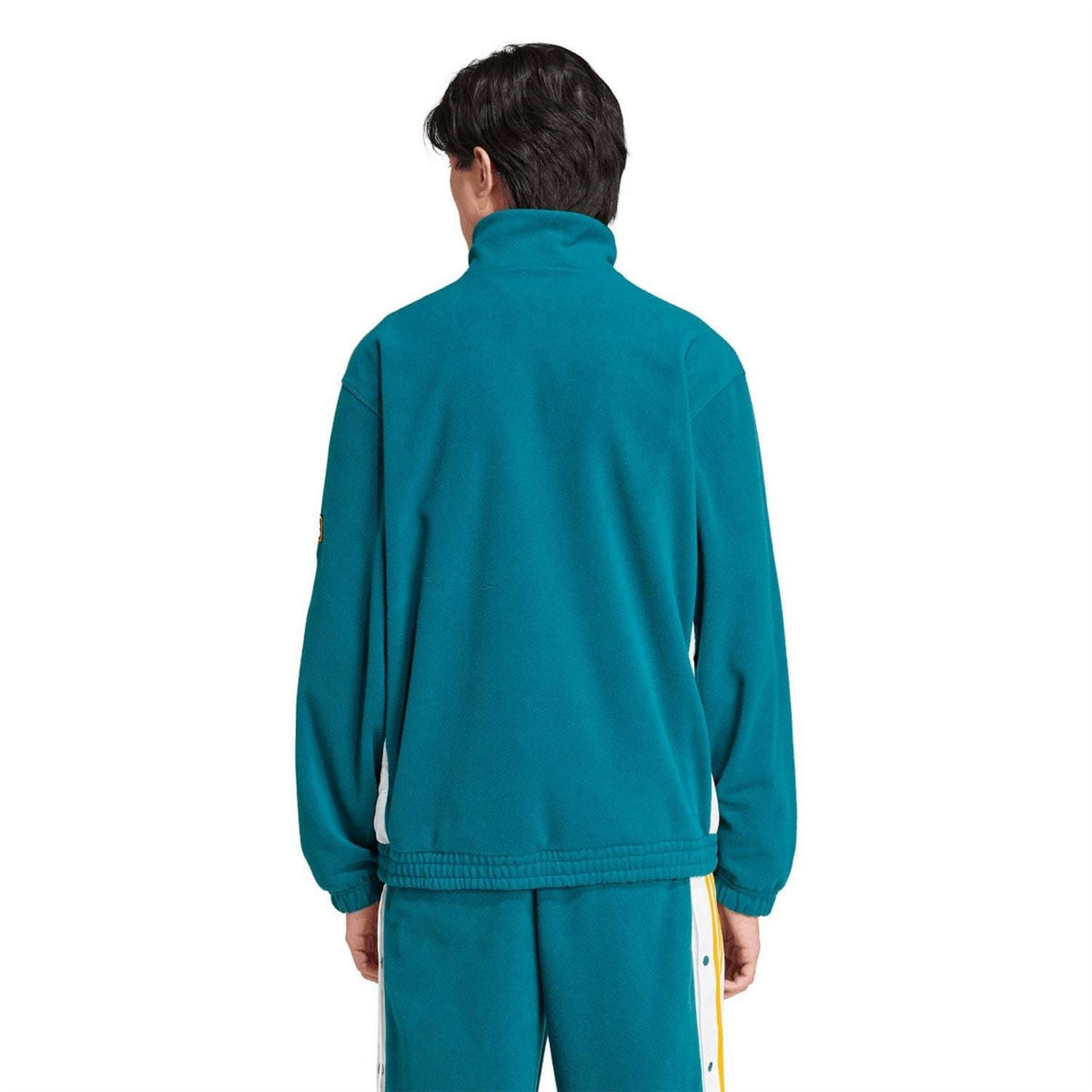 Teal fleece track jacket with high collar and elastic cuffs, back view