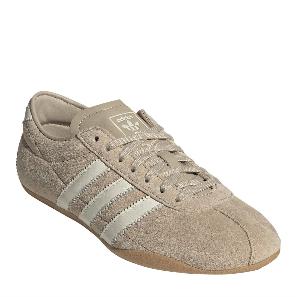 Stone khaki suede-style low top sneakers with lace-up closure, white stripes, adidas Tokyo