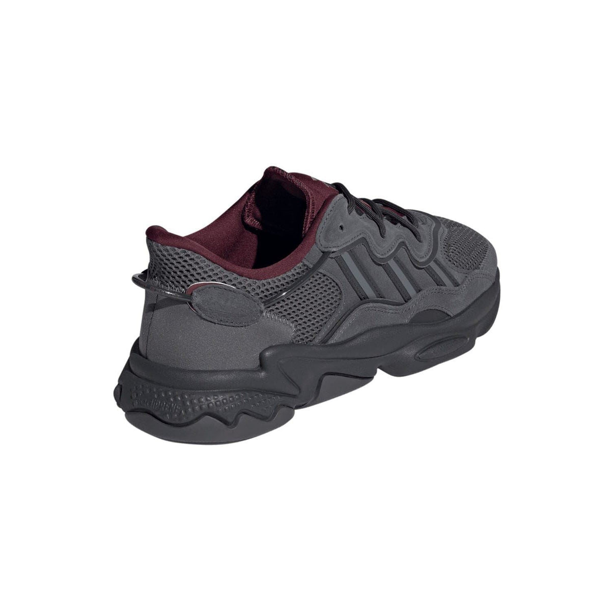 Grey running sneaker with burgundy lining and mesh upper, rear view