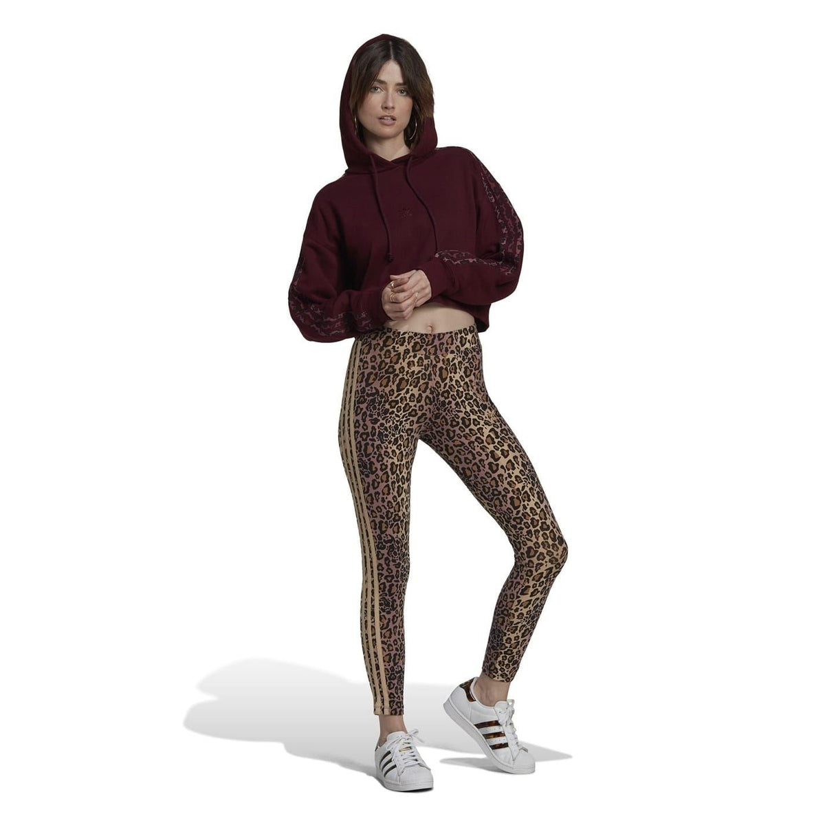 adidas Originals leopard-print 7/8 leggings on model with slim tapered legs