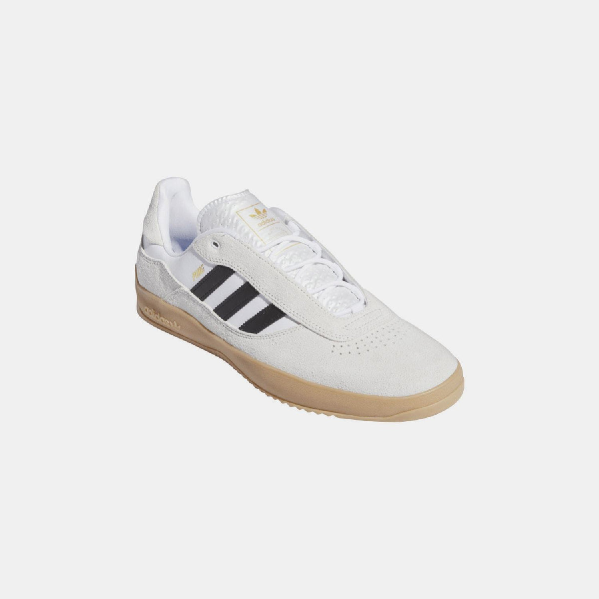 adidas Originals Puig Trainers footwear in white with black accents, featuring classic sneaker design and breathable mesh material