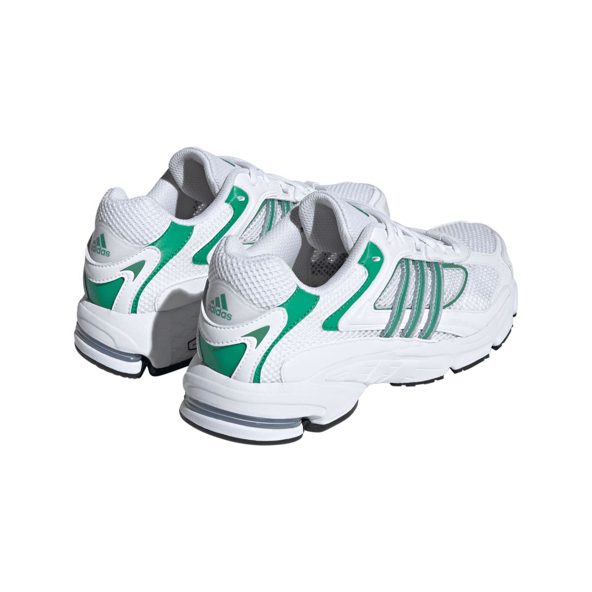 White trainers with green heel and side stripes; visible lace-up and padded collar