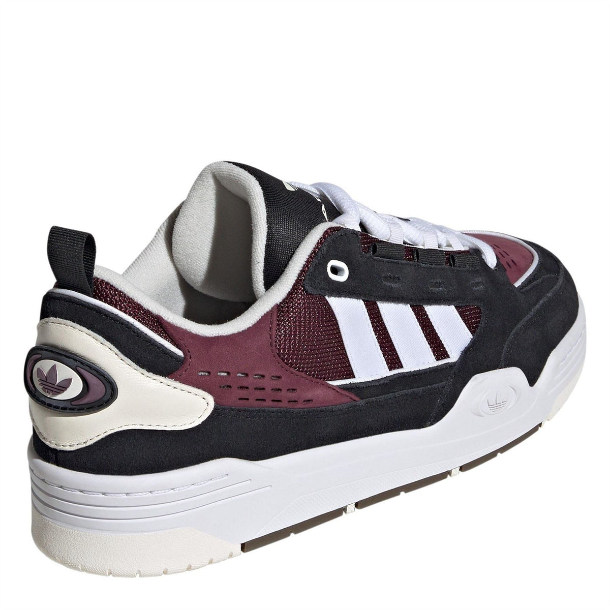 adidas Originals Adi2000 men's low-top trainers in black with white accents, showcasing the classic sneaker design and brand logo