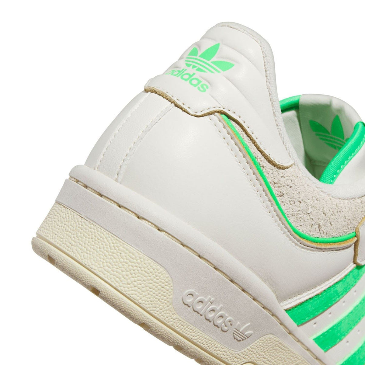adidas Originals rivalry trainers, close-up of white leather-look heel with green trim