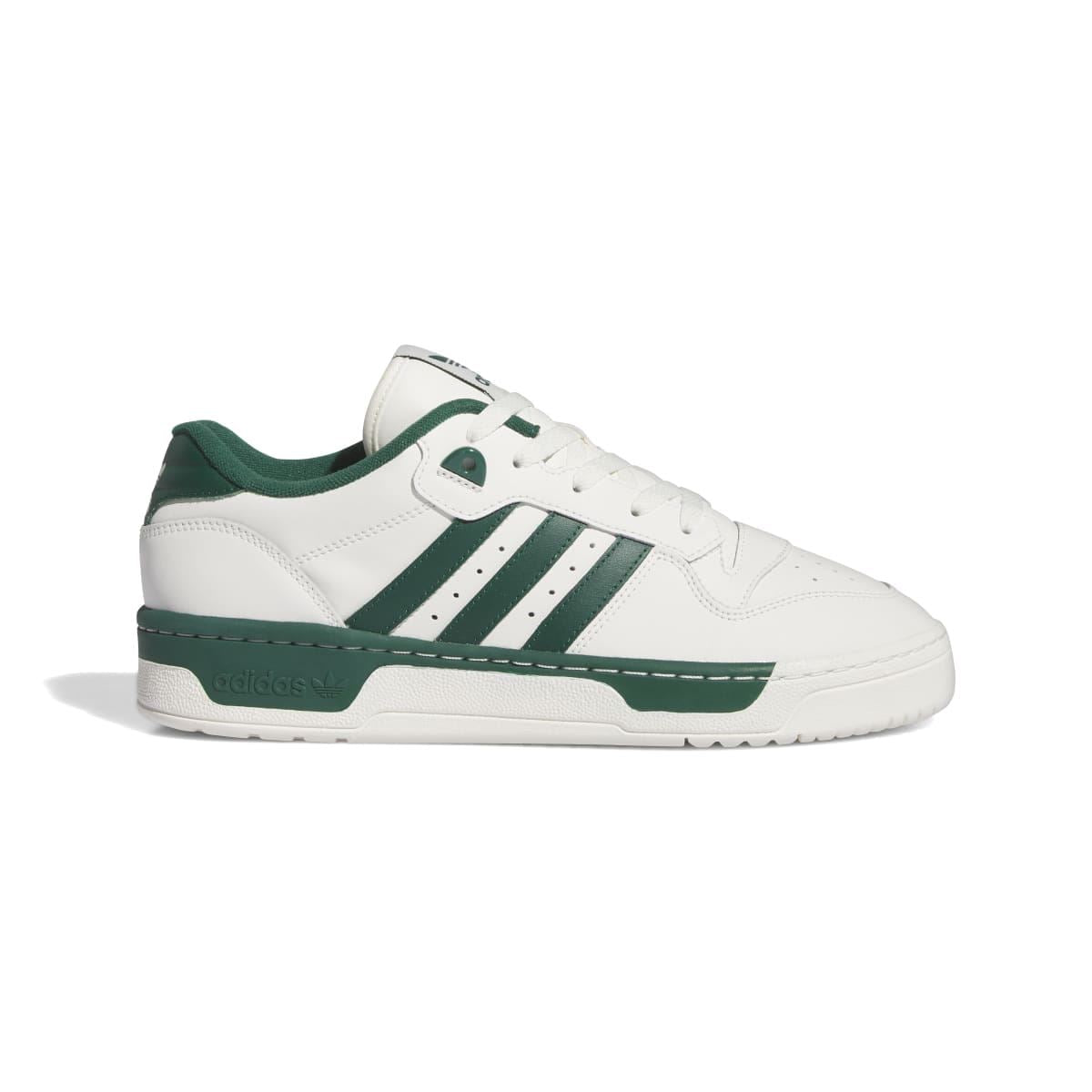 adidas Rivalry Low trainers in white with green leather panels and three-tone stripe detail