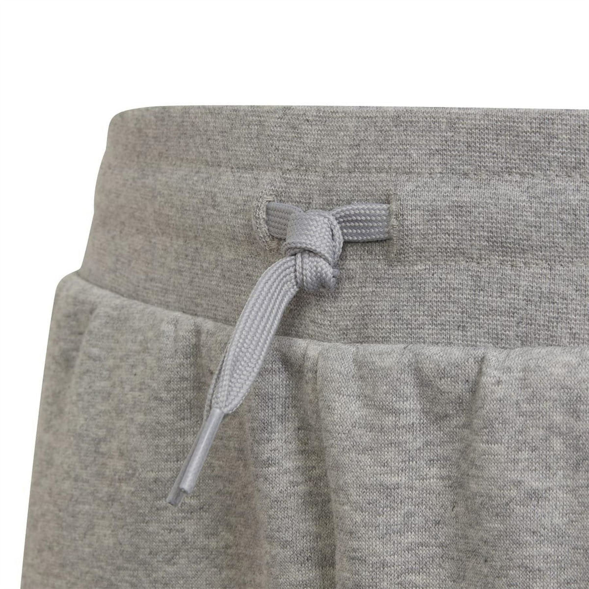 Grey shorts detail: drawstring cord at the elastic waistband cuff