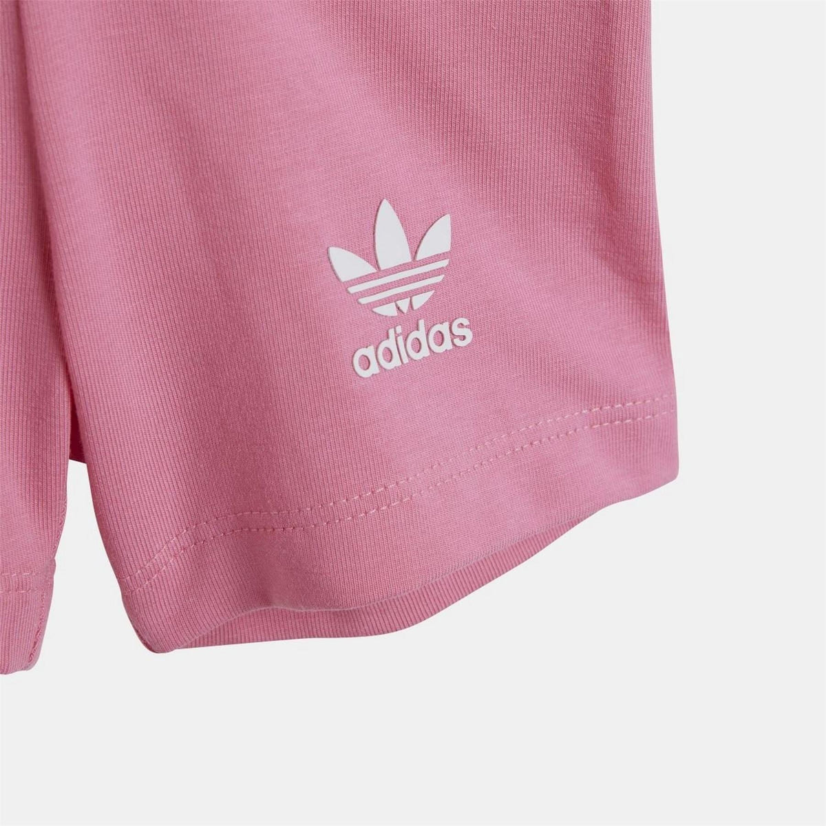 Pink adidas T-shirt hem with small chest logo