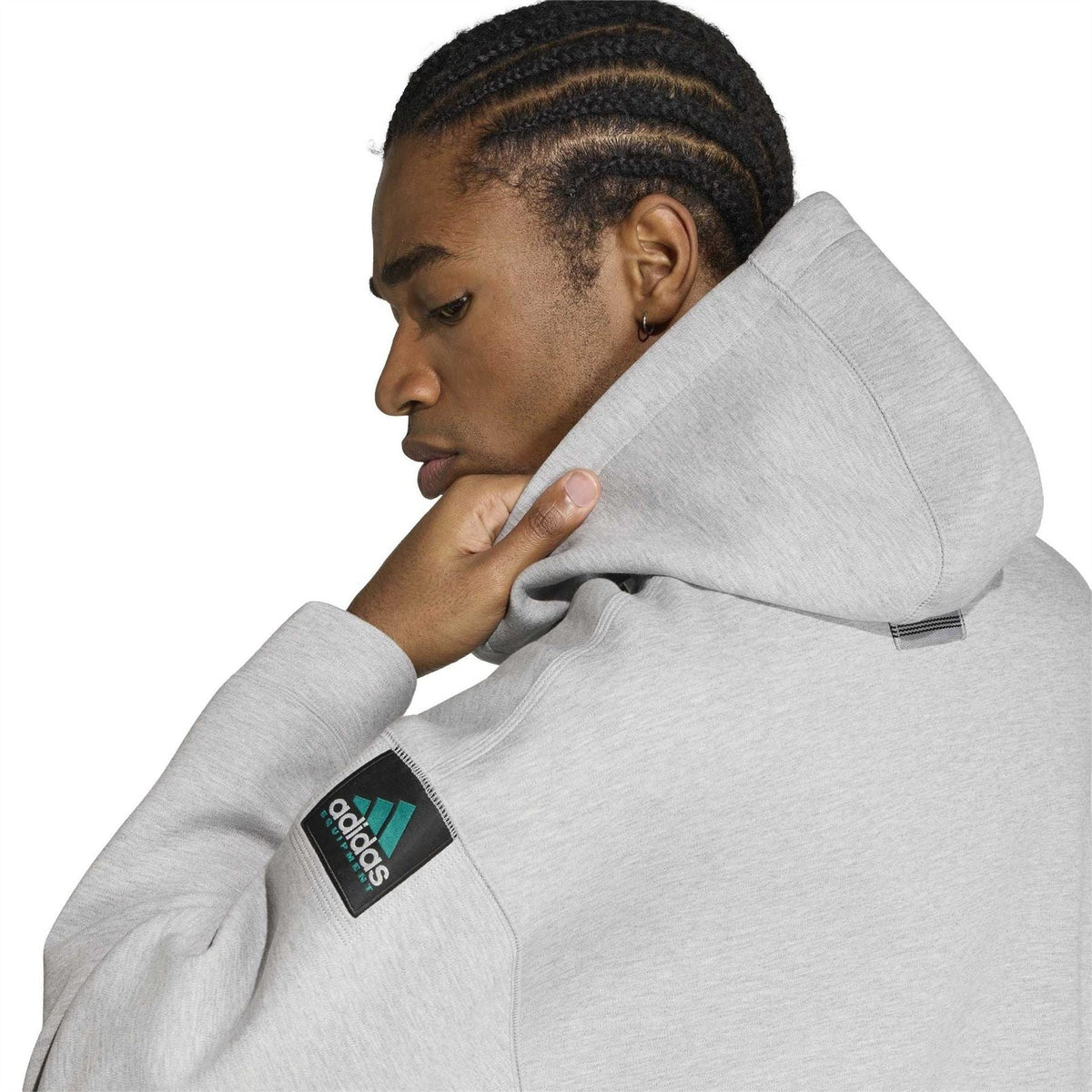 Grey heather hooded jacket close-up of adidas Originals label on sleeve