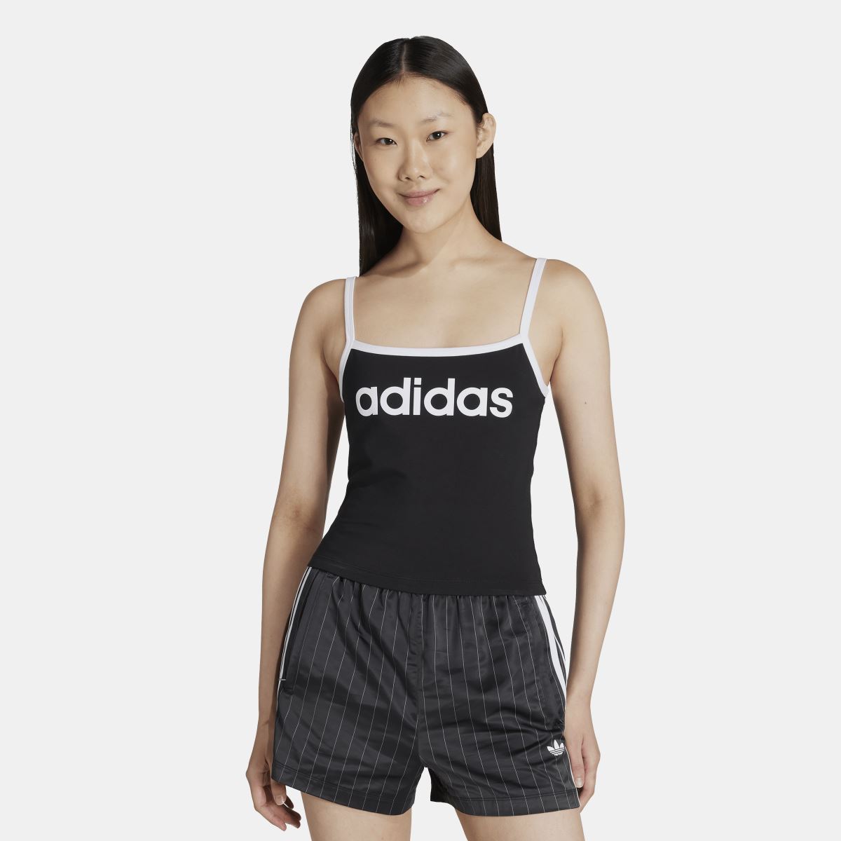 Black tank top with adidas logo band, scoop neckline and thin white-trim straps