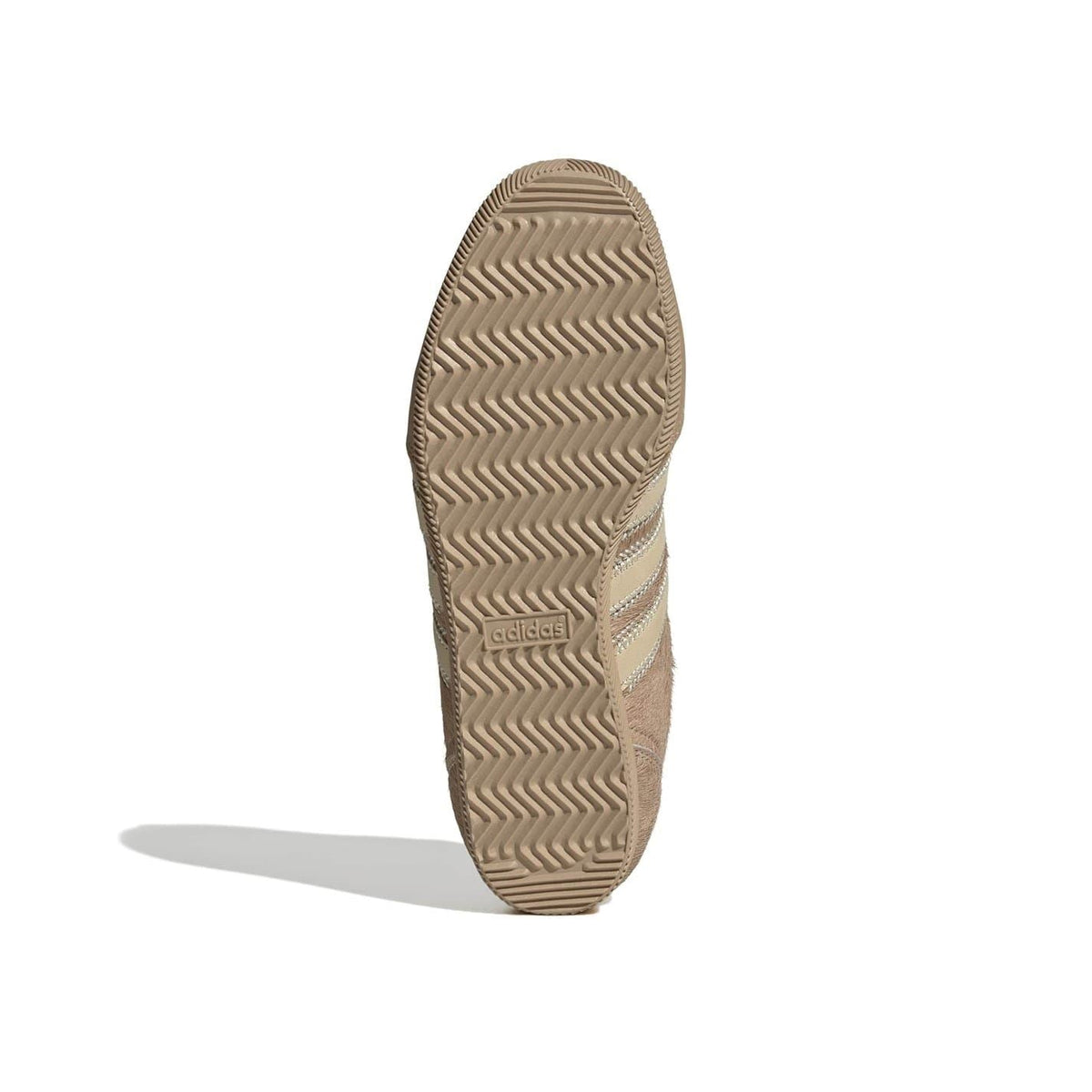 Japan shoes outsole with herringbone tread and adidas logo on heel