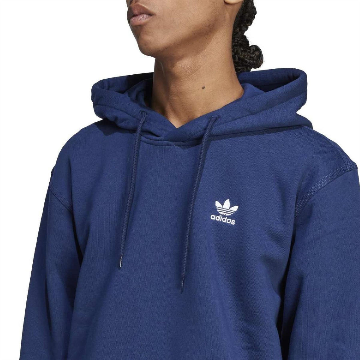 adidas Originals hoodie close-up in dark indigo with Trefoil logo and drawstring hood