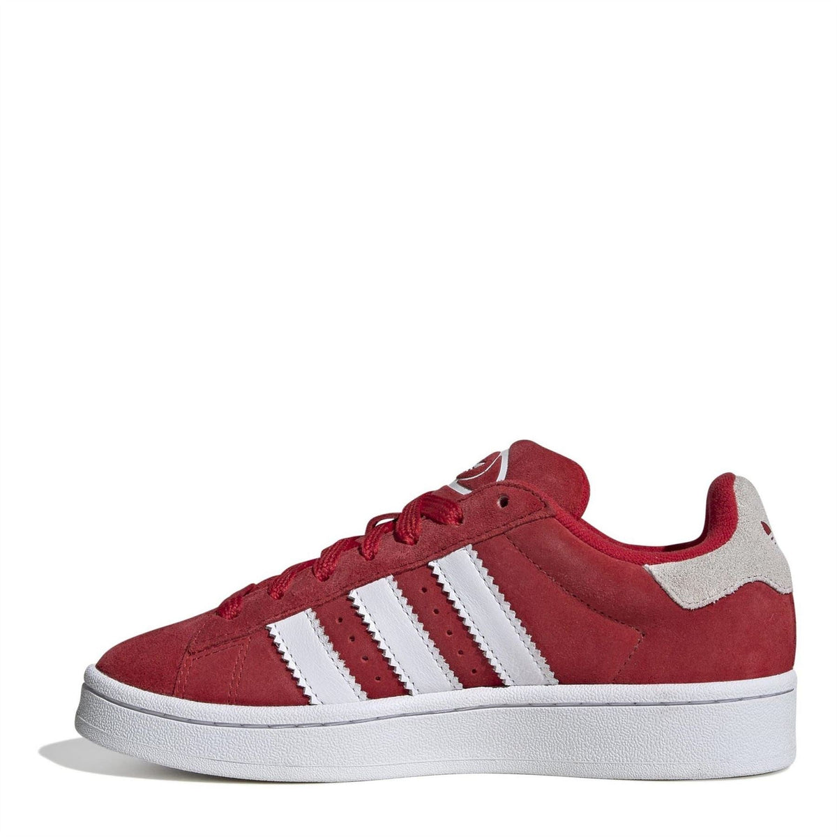 Red kids low-top sneakers with white side stripes, suede upper, and padded collar