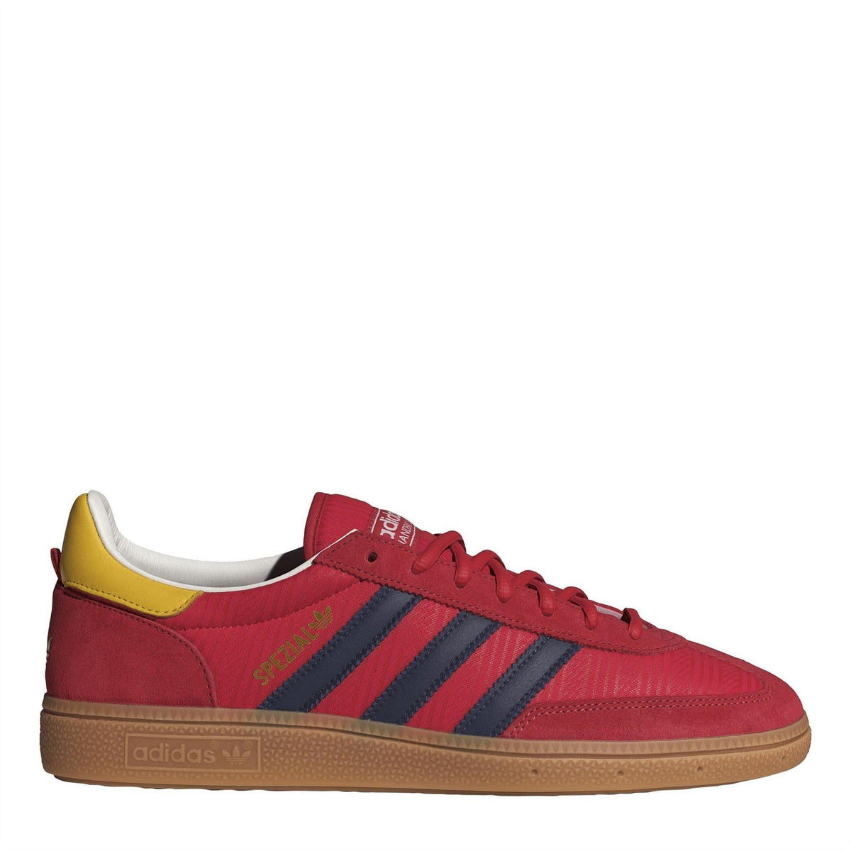 Men's low-top trainers in red with navy stripes, white lining and yellow heel