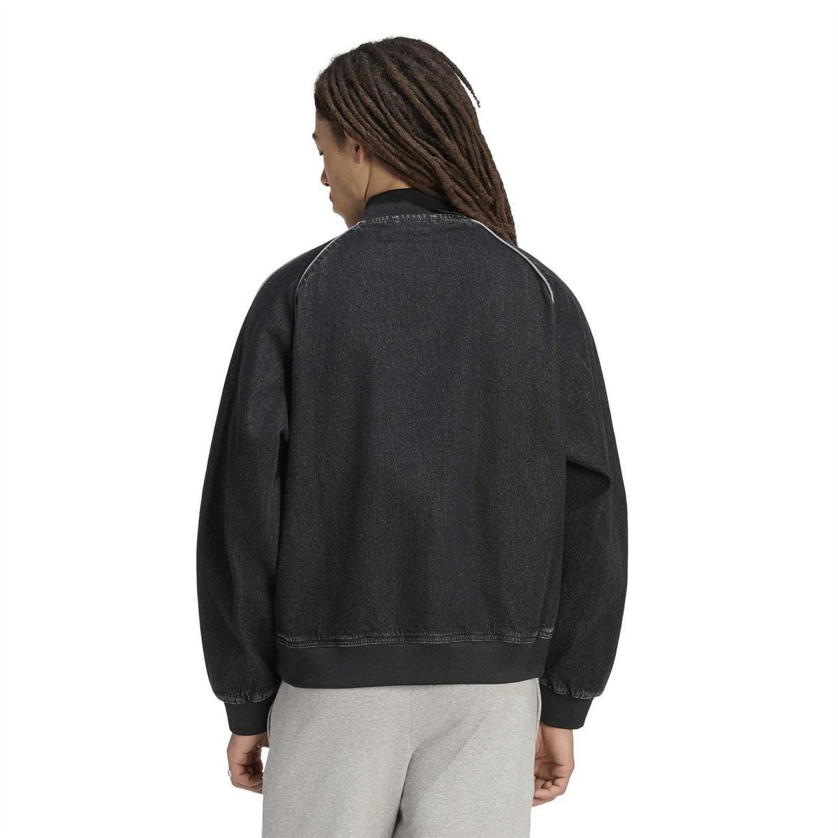 Black denim bomber jacket back view with ribbed collar and cuffs.