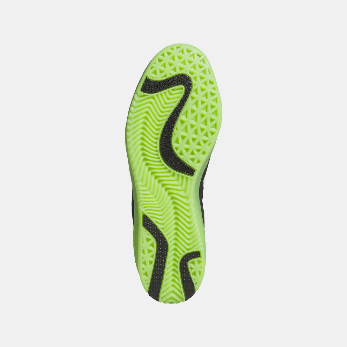 Green rubber outsole with textured tread and black sidewall