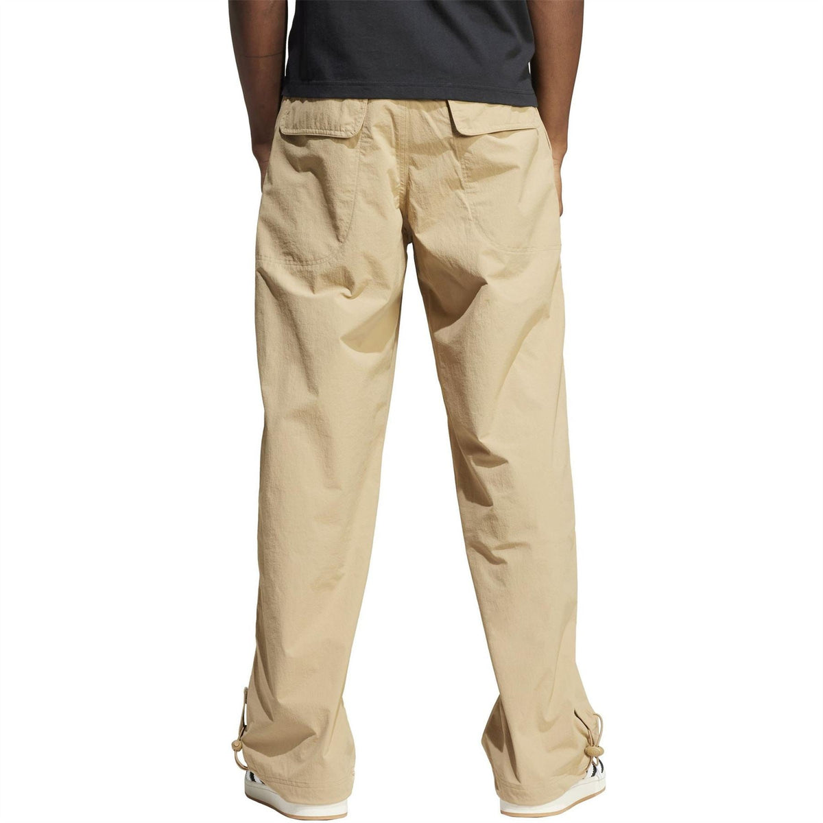 adidas Originals beige cargo pants with back flap pockets and relaxed straight-leg fit