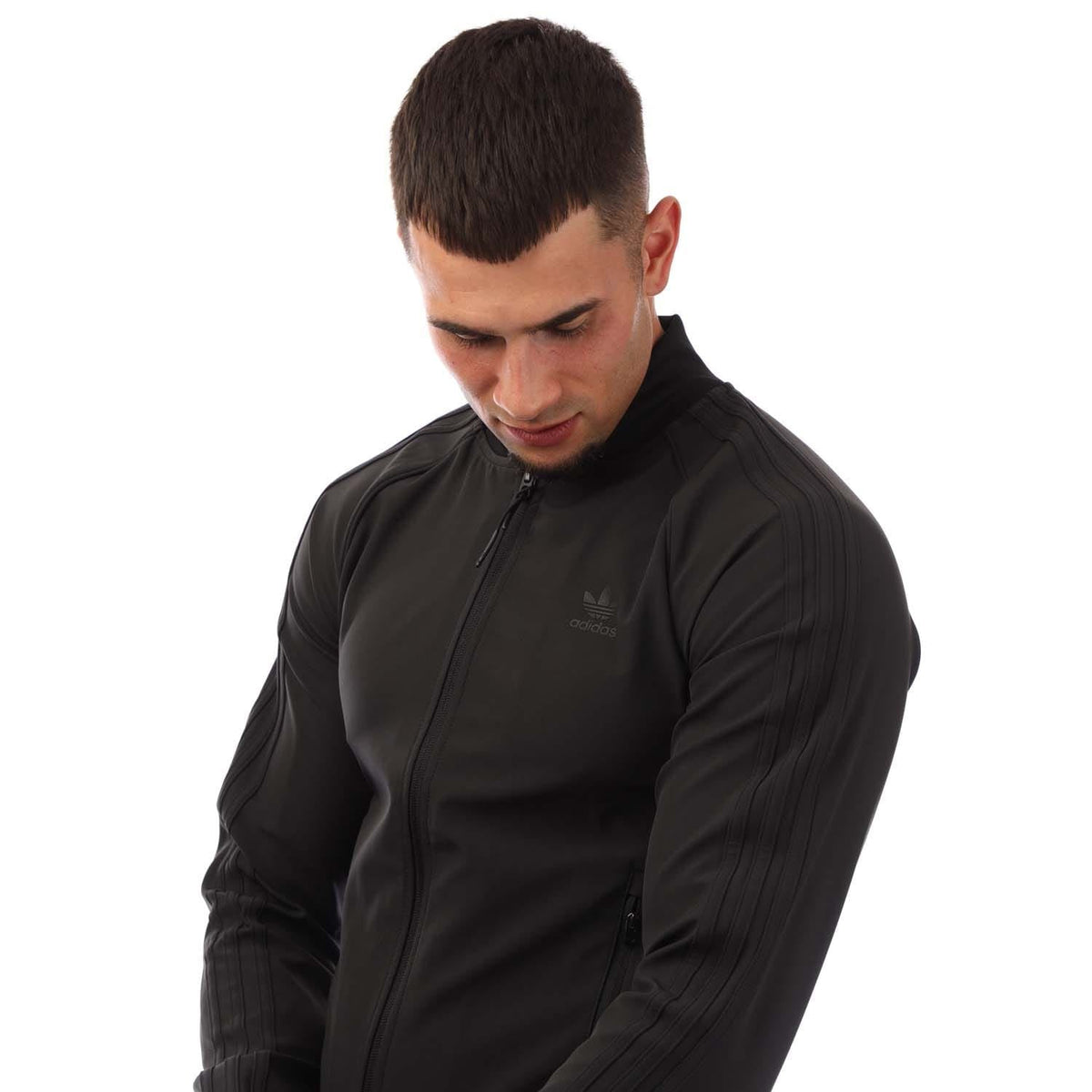 adidas Originals SST Bonded Track Top in black with white stripes, featuring a full zip and sporty collar for athletic style