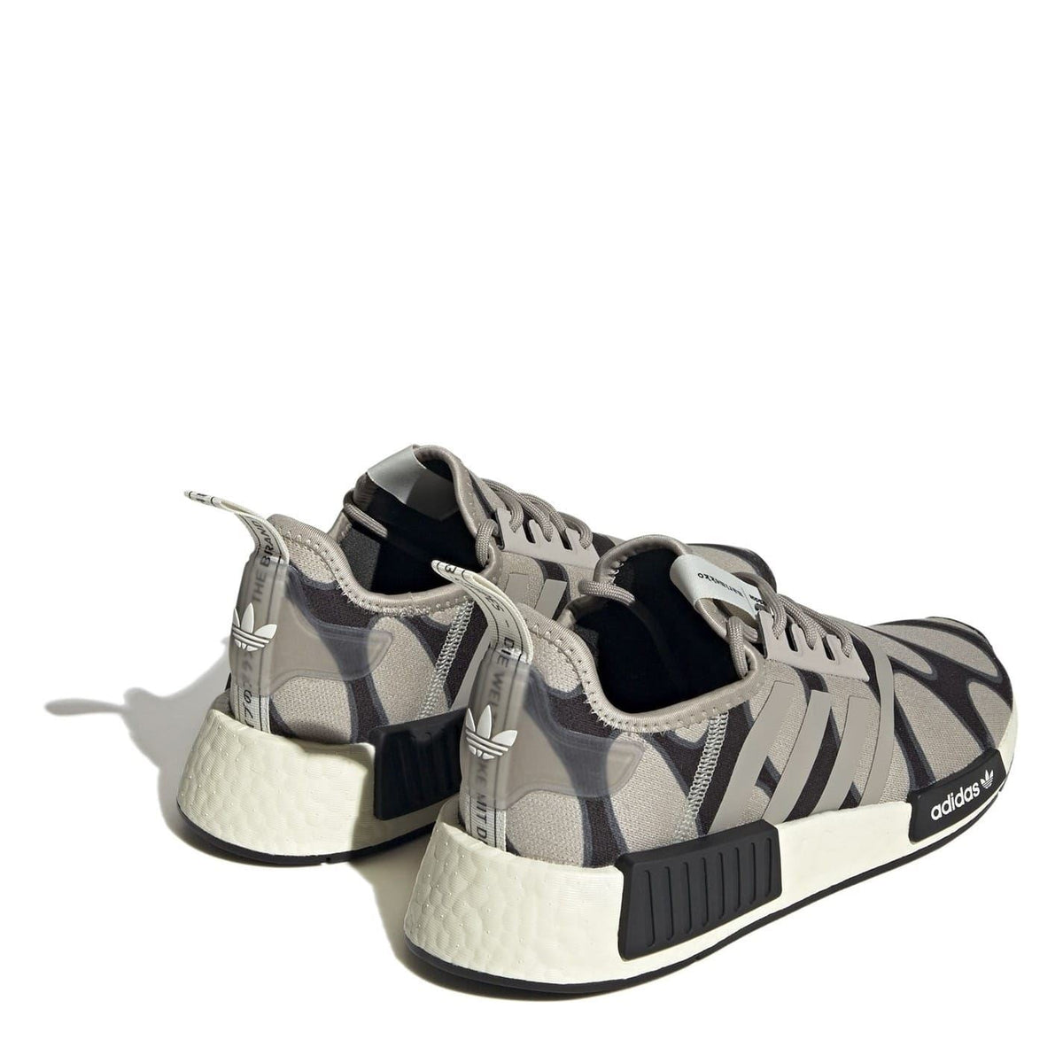 adidas Originals NMD R1 low top sneakers in black with white Boost midsole and signature branding, casual footwear for everyday wear