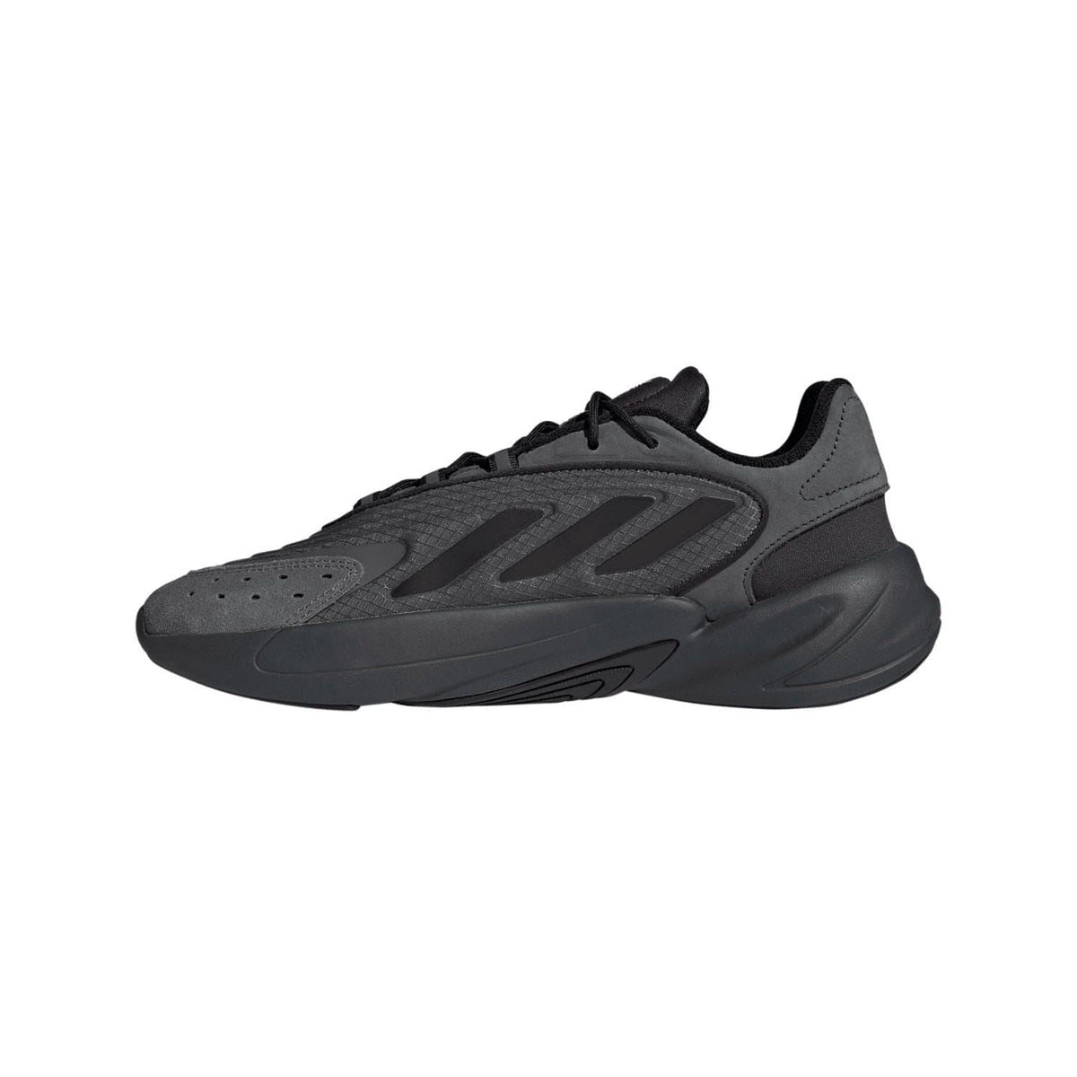 Grey adidas Originals Ozelia trainers, angled side view with panel details and laces