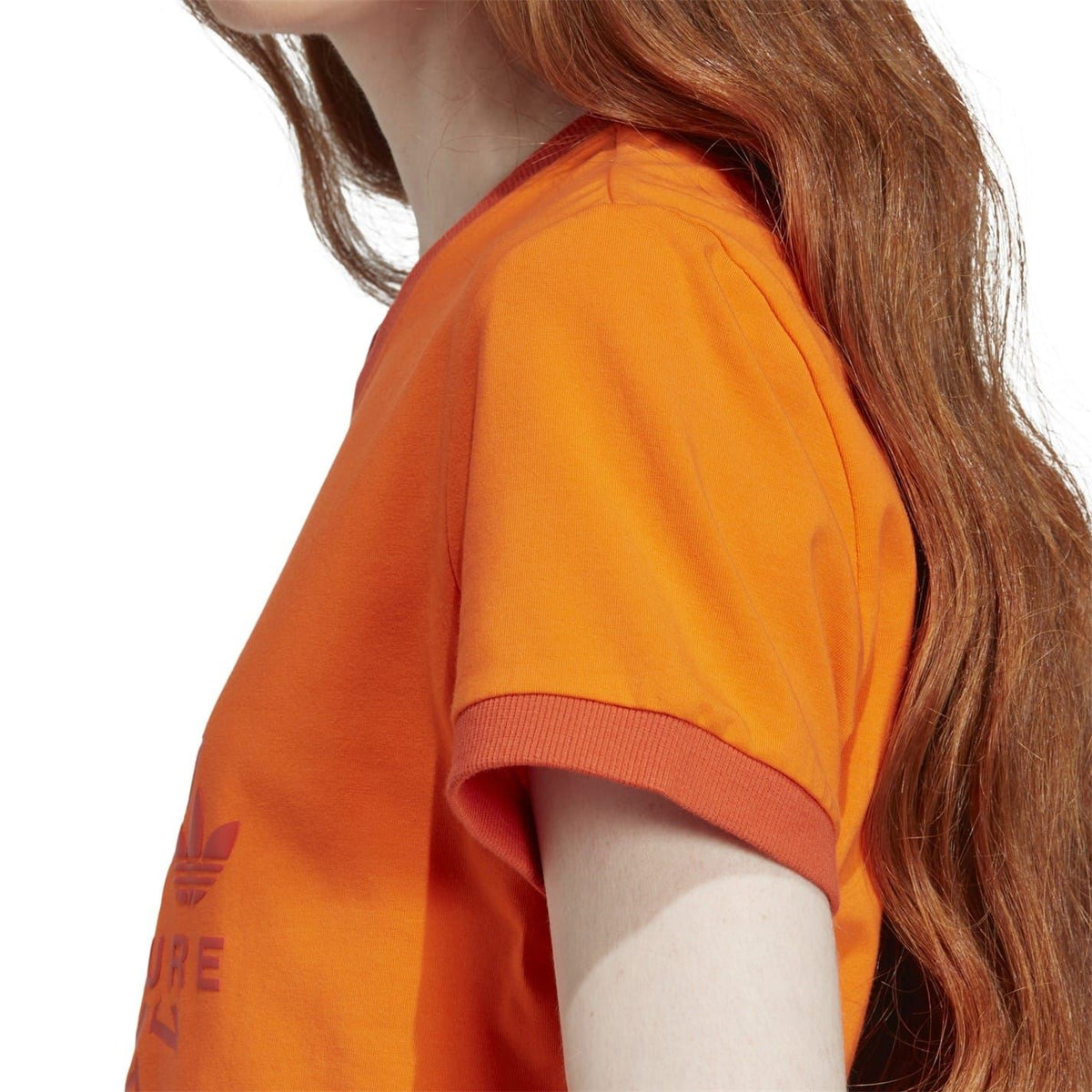 Orange short-sleeve crewneck T-shirt with ribbed collar and subtle side logo