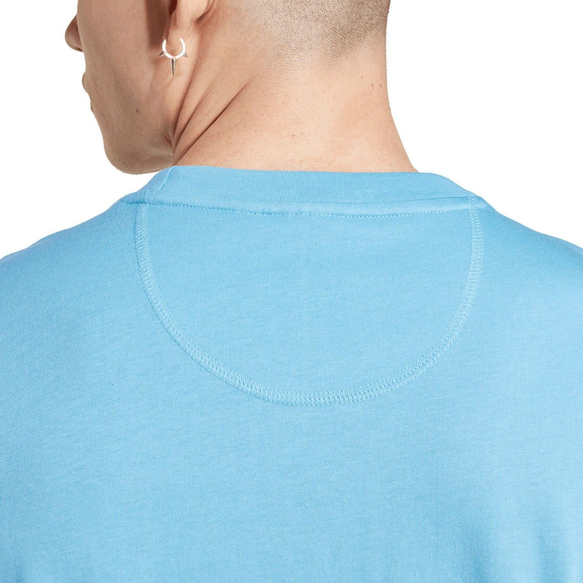 Blue T-shirt back neckline with crew neck seam stitching