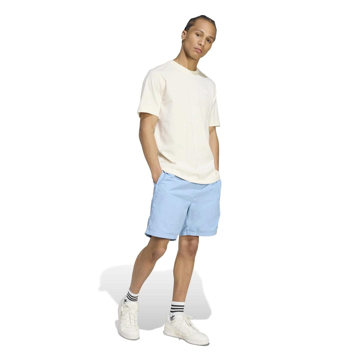 Light blue adidas Originals shorts, knee-length with elastic waistband