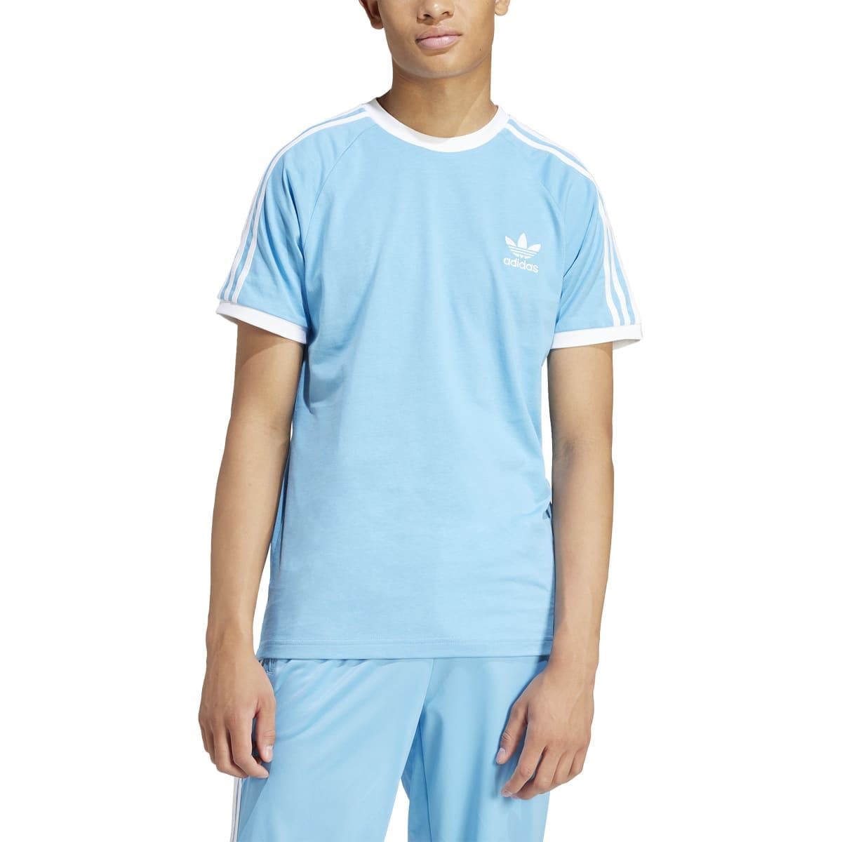Light blue adidas crew-neck T-shirt with chest logo and three white sleeve stripes