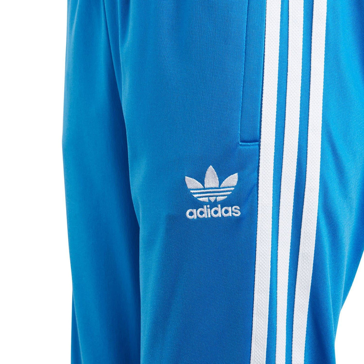 Blue track pants with adidas logo, white side stripes, side pocket