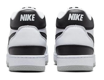White and black Nike low-top QS sneakers with NIKE heel branding