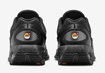 Kids' Nike Air Max DN black sneakers, rear view with heel logo patch