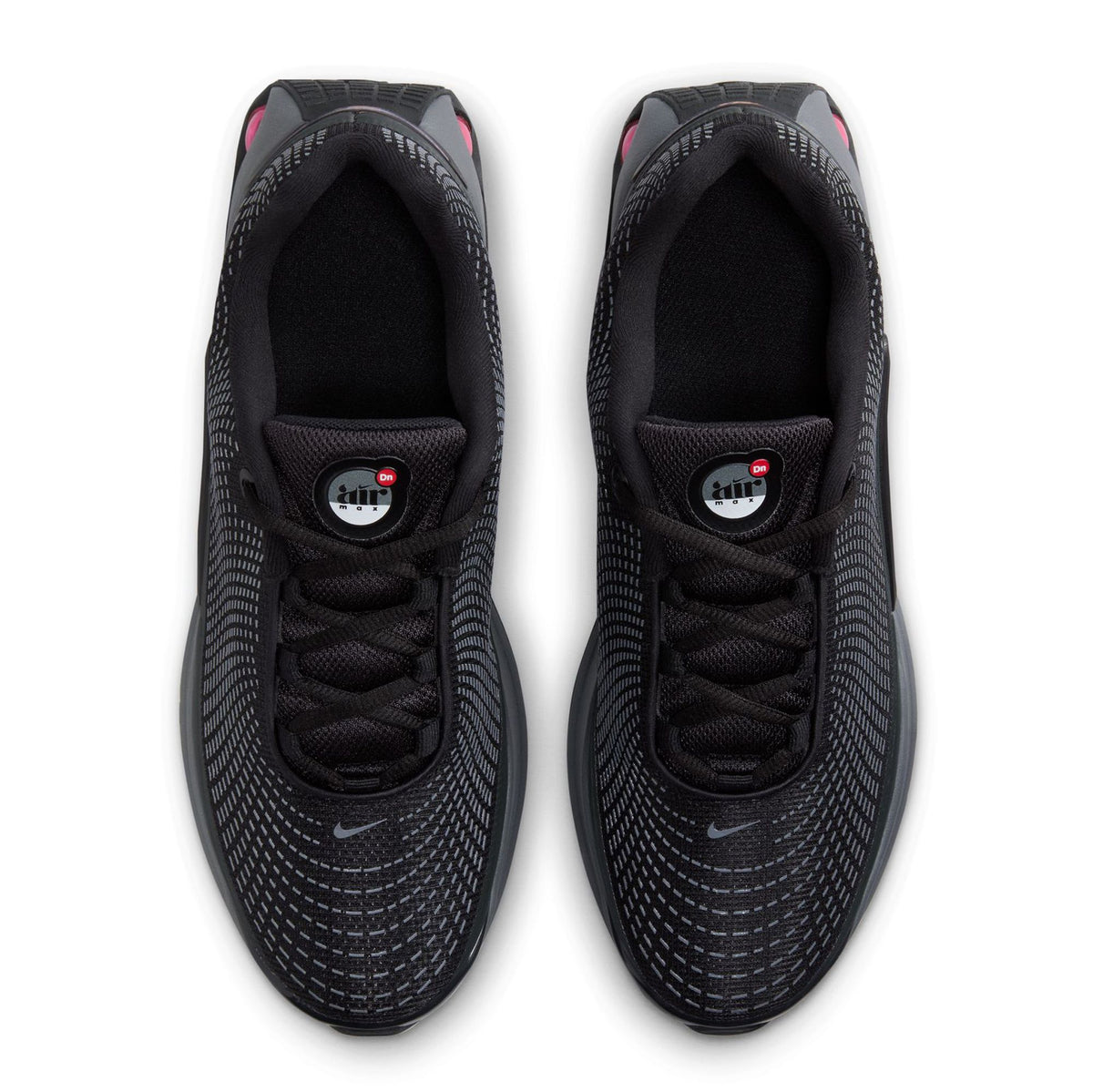 Kids' Nike Air Max DN front view, black mesh upper with lace-up and Nike swoosh