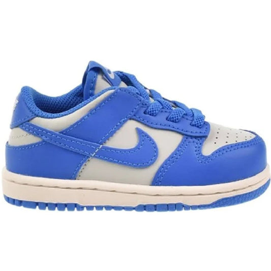 Toddler Nike Dunk Low sneakers in light blue and white, lace-up with padded collar