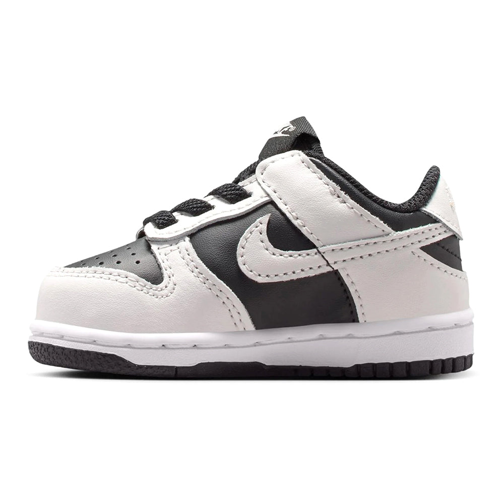 Toddler Nike Dunk Low sneakers, black mid-panel and white overlays with lace-up eyelets
