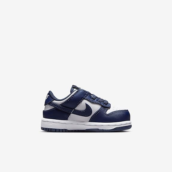 Toddler low-top sneakers in navy blue and white, lace-up with padded collar