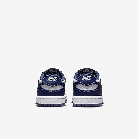 Toddler low-top sneakers, navy blue with 'NIKE' on heel, lace-up