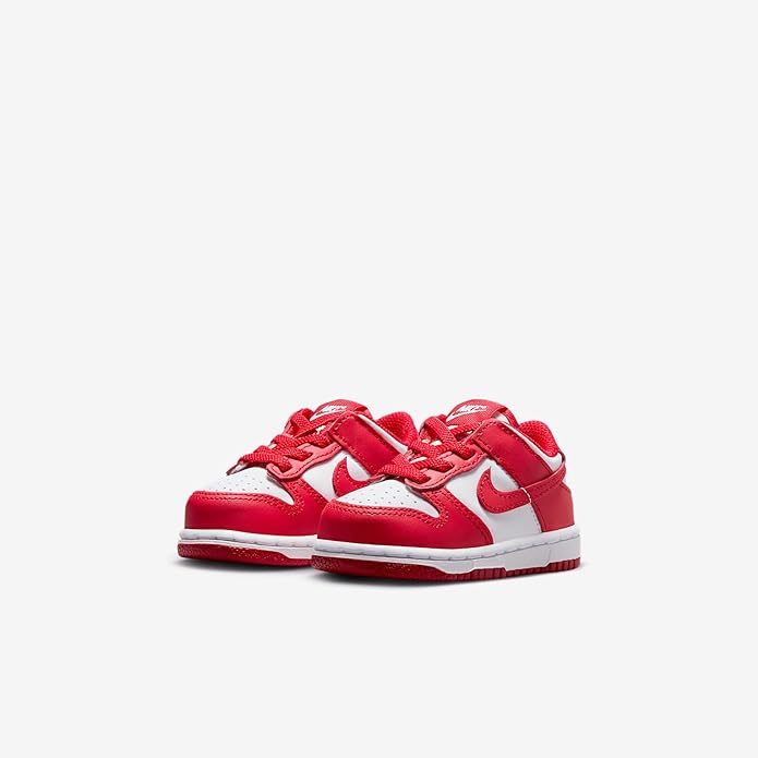 Toddler Nike Dunk Low sneaker with red upper, white swoosh, and front lace-up