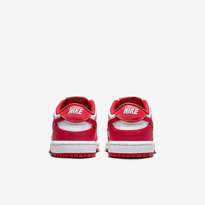 Toddler Nike Dunk Low sneaker with Nike logo on heel and red-and-white rear
