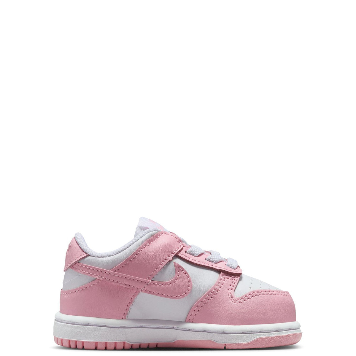 Toddler Nike Dunk Low sneakers side view, pink/white upper with hook-and-loop strap