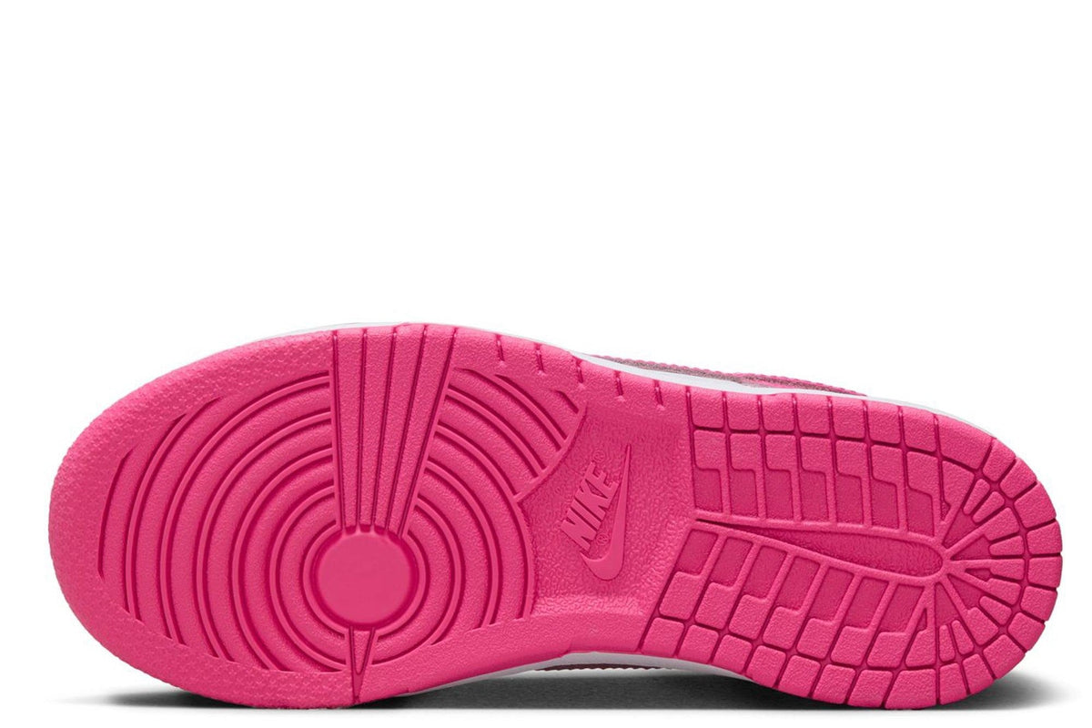 Kids' Nike Dunk Low outsole, pink rubber tread with Nike branding