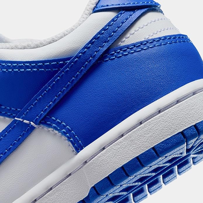 Nike Dunk Low kids sneaker detail: white midsole with Hyper Royal outsole edge