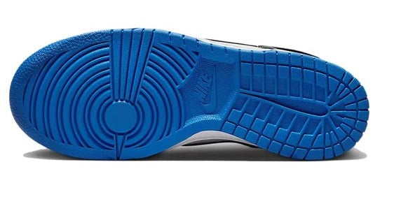 Kids' Nike Dunk Low outsole with blue traction tread