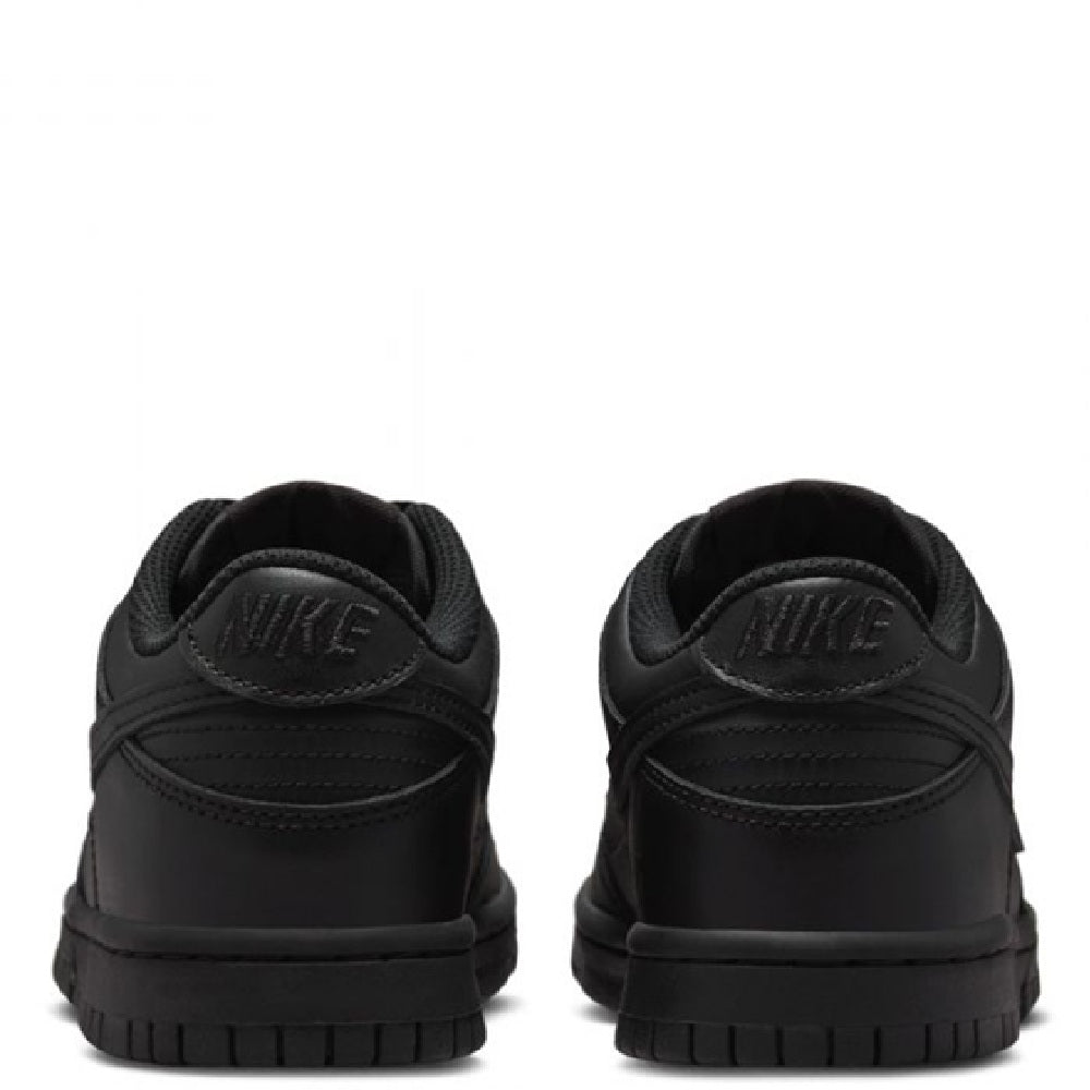 Nike Dunk Low black sneakers from heel view with Nike logo and cushioned collar.