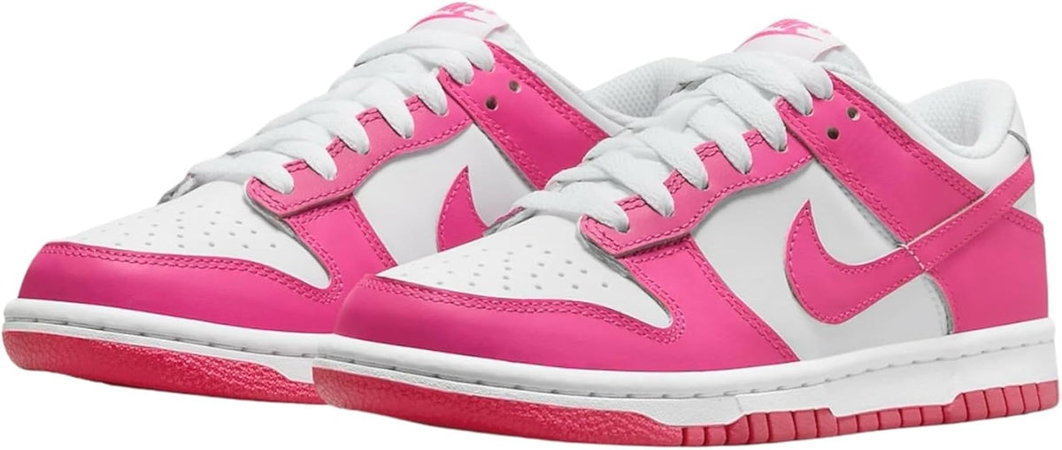 Nike Dunk Low big kid sneakers, white-and-hot-pink lace-up uppers with Swoosh detail