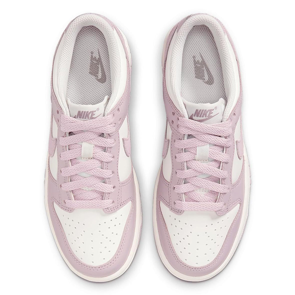 Big kid's Nike Dunk Low sneakers, pink laces and rose toe caps, front view.